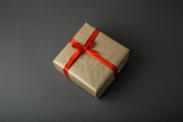 Gift box on a dark background. Top view with place for text. - 写真・画像