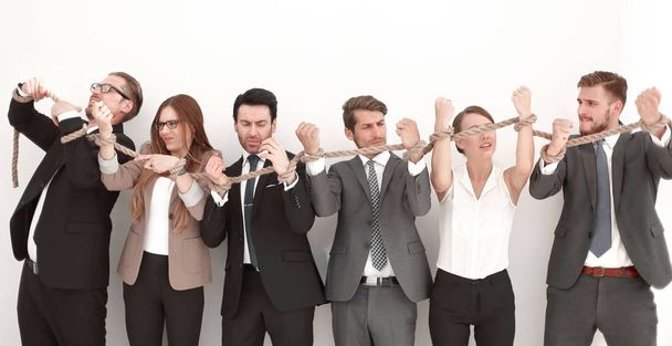 group of business people breaking a strong rope - Photo, image