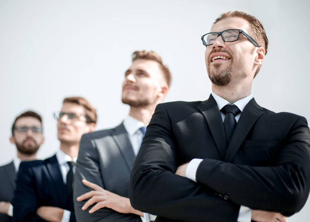 successful businessman standing in front of business team - Фото, изображение