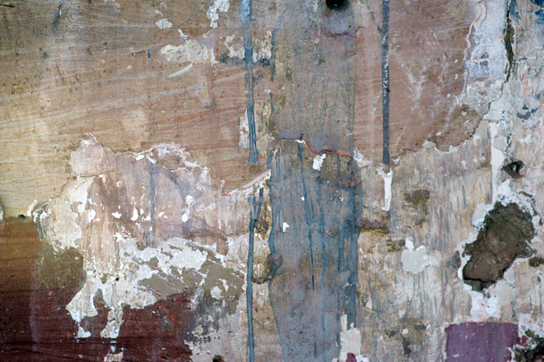 Make repairs on the house wall / The close-up of a house wall with paint splashes and repair points - Photo, Image