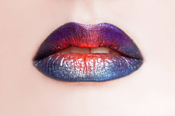Delightful lip makeup, multi-colored transitions. Beautiful women's lips with bright lipstick, bright stylish makeup - Fotoğraf, Görsel