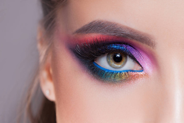 Amazing Bright eye makeup in luxurious blue shades. Pink and blue color, colored eyeshadow - Fotografie, Obrázek