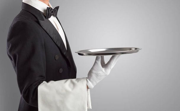 Waiter serving with white gloves and steel tray - Fotoğraf, Görsel