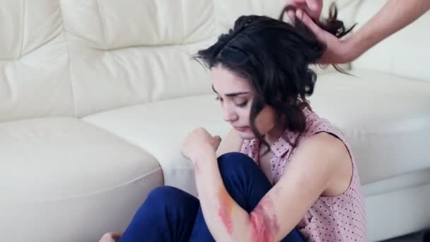 Concept of domestic violence and abuse. A young woman is abused - Footage, Video