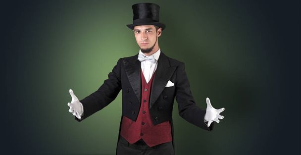 Magician holds something invisible  - 写真・画像