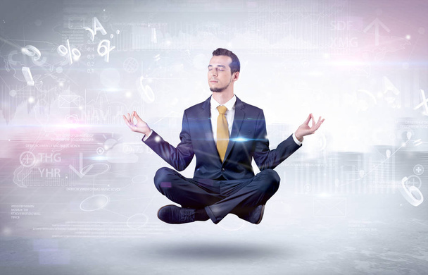 Businessman meditates with enlightenment concept - Fotografie, Obrázek