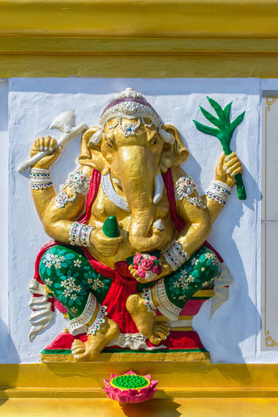 Colorful Ganesha Hindu god avatar images in stucco low relief white wall at the public Wat Samarn temple, Chachoengsao, Thailand. Ganesha also known as Ganapati, Vinayaka, Pillaiyar and Binayak. - Foto, immagini