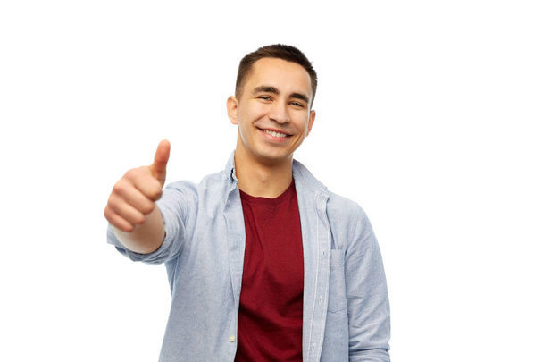 happy young man showing thumbs up - Foto, Imagen