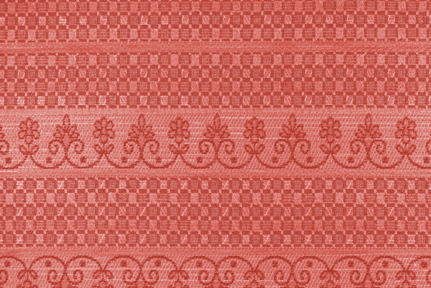Fundo de tecido com padrões geométricos. Close-up - (foto é tonificada em Living Coral
). - Foto, Imagem