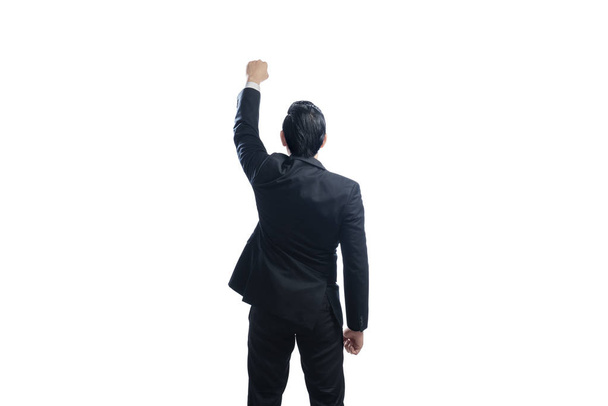 Image of rear view of asian businessman with arms up posing isolated over white background - Photo, Image