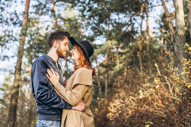 Happy young romantic couple spend time together outdoor - Фото, зображення
