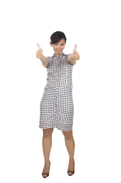 Young woman with two thumbs up - Foto, immagini