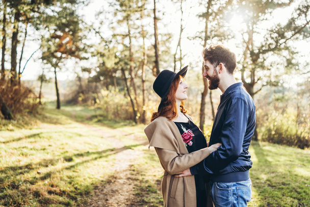 Happy young romantic couple spend time together outdoor - 写真・画像