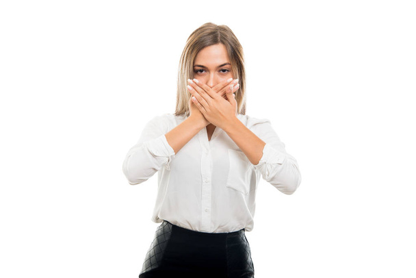 Beautiful business woman covering mouth like not speaking isolated on white background - Foto, Imagem