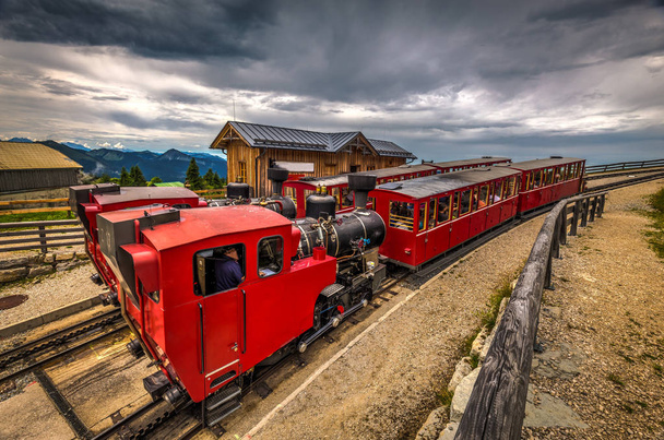 Two trains with steam locomotive waiting in Schafbergalpe station - Photo, Image