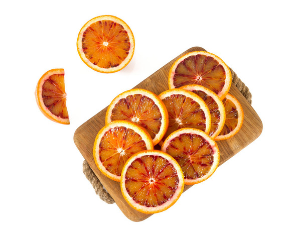 blood orange juice and sliced oranges - Foto, Imagem