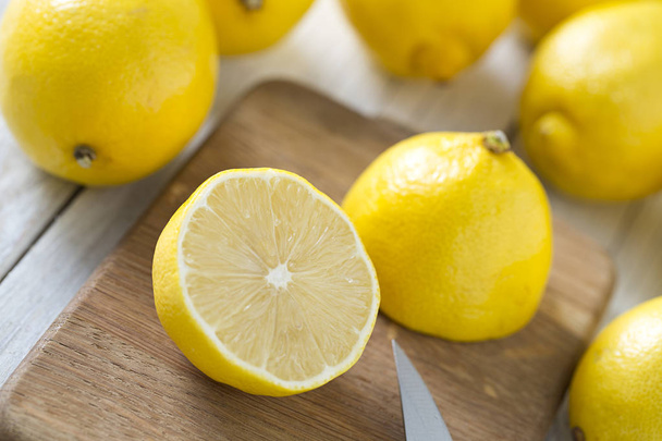 lemons on wooden surface - Foto, immagini