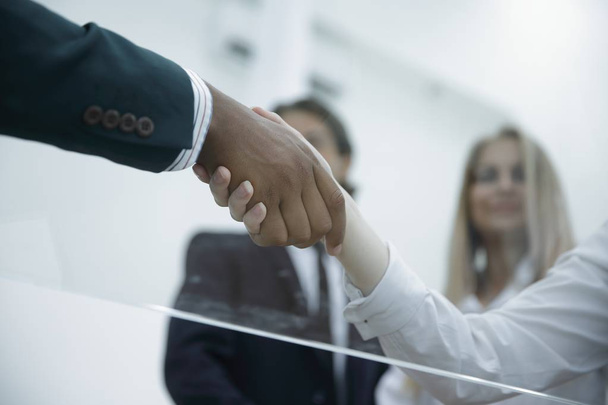 bottom view .handshake business women with a business partner - Foto, Imagem