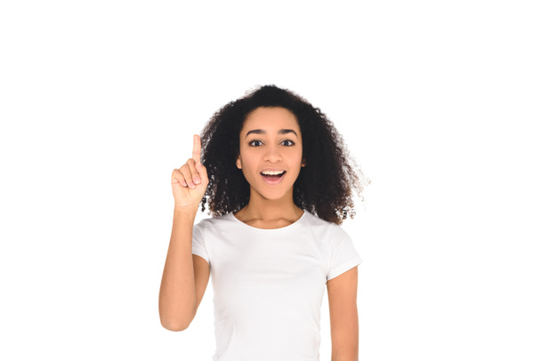 attractive african american girl in t-shirt showing idea gesture isolated on white - 写真・画像