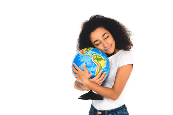 curly african american girl hugging globe isolated on white - Foto, afbeelding