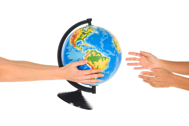 cropped view of woman giving globe to african american girl isolated on white - Photo, Image