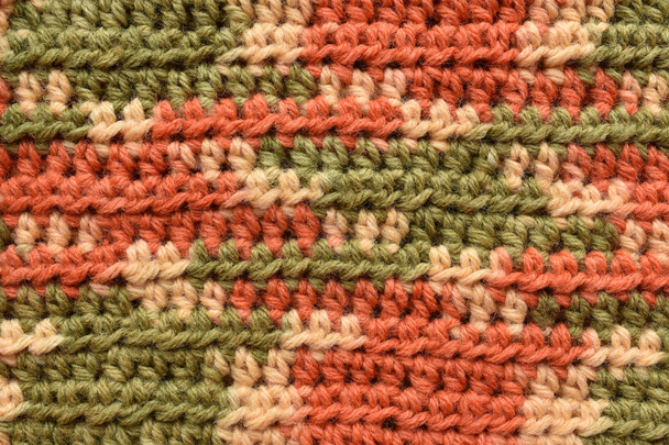 μια άνευ ραφής κροσέ υφή, πράσινο, πορτοκαλί, μπεζ - Φωτογραφία, εικόνα