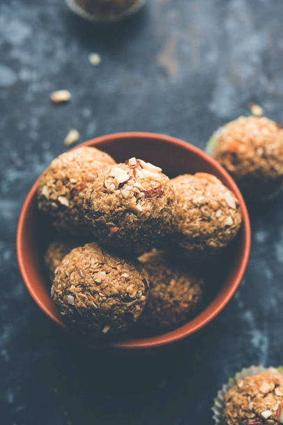 Oats laddu or Ladoo also known as Protein Energy balls. served in a plate or bowl. selective focus - Fotografie, Obrázek
