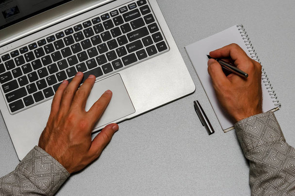 Closeup view of business man hands working with laptop. - 写真・画像