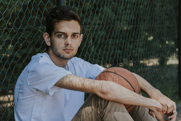 young to fashion with basketball - Foto, immagini