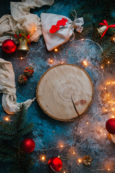 flat lay with wooden stump and festive decorations - Photo, Image