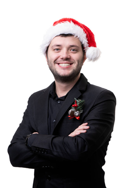 Image of happy man in santa cap with arms crossed - Zdjęcie, obraz