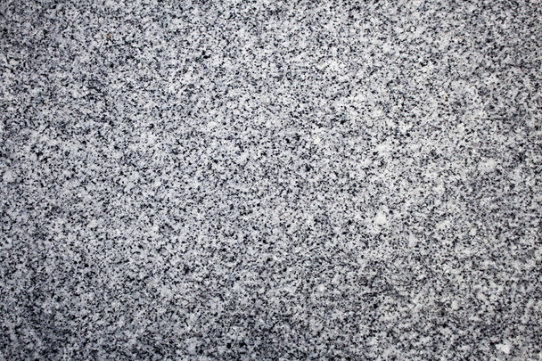 Superficie de piedra de granito blanco y negro, perfecta para su uso en fondo o textura
. - Foto, imagen