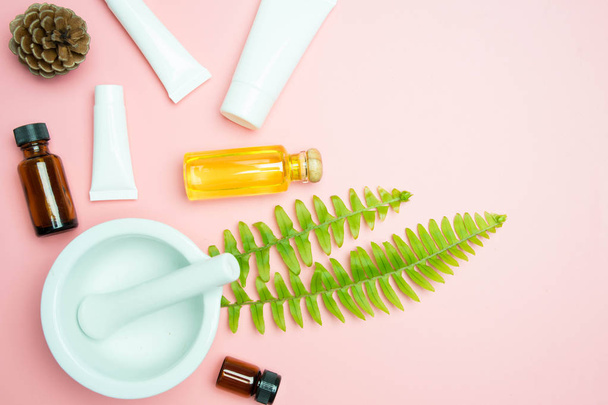 natural cosmetics skincare and leaves on pink background - Photo, Image