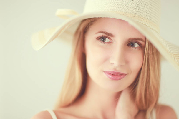Portrait of beautiful model in hat ,isolated on white background - Fotó, kép
