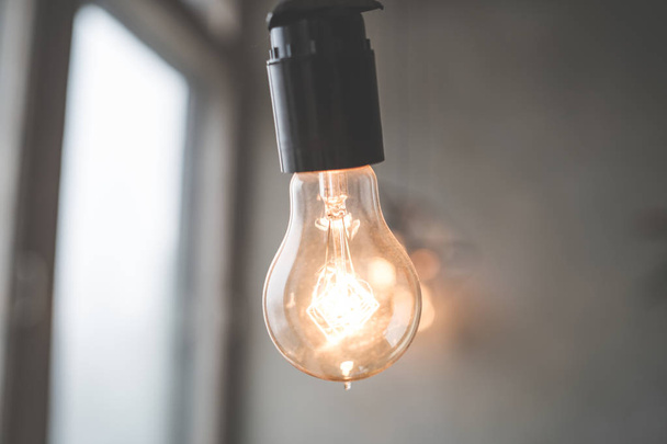 Lamps with tungsten filament. Edison light bulb. Filament filament in vintage lamps. Retro design of light bulbs.  - Foto, immagini