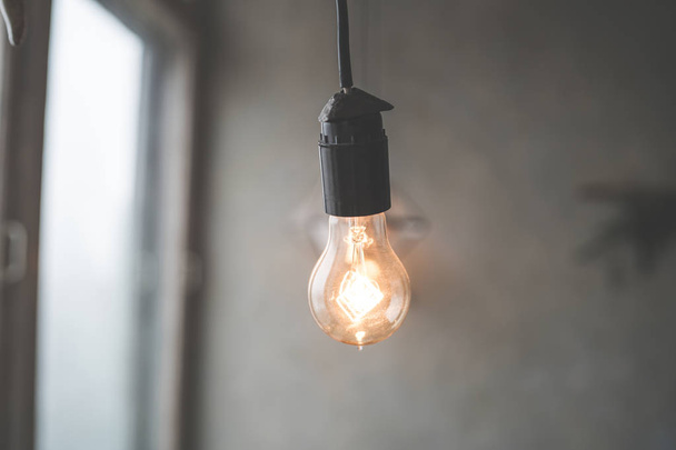 Lamps with tungsten filament. Edison light bulb. Filament filament in vintage lamps. Retro design of light bulbs.  - Zdjęcie, obraz