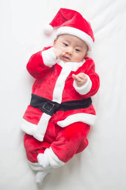 Christmas Santa Claus asian baby boy and happy new year festival - Foto, imagen