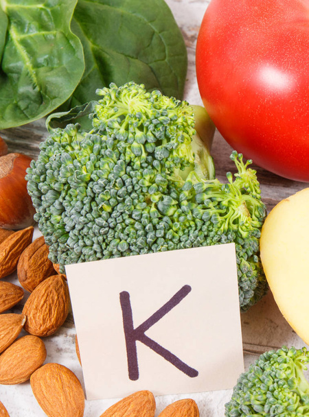 Fresh fruits and vegetables containing vitamin K, potassium, dietary fiber and natural minerals, healthy nutrition concept - Fotó, kép
