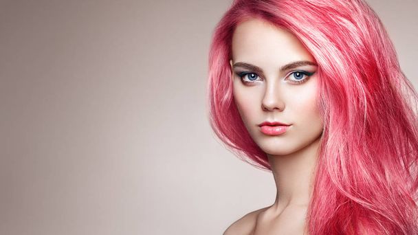 Beauty Fashion Model with Colorful Dyed Hair. Girl with perfect Makeup and Hairstyle - Photo, image