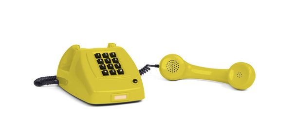 Teléfono amarillo vintage con fondo blanco - Foto, Imagen