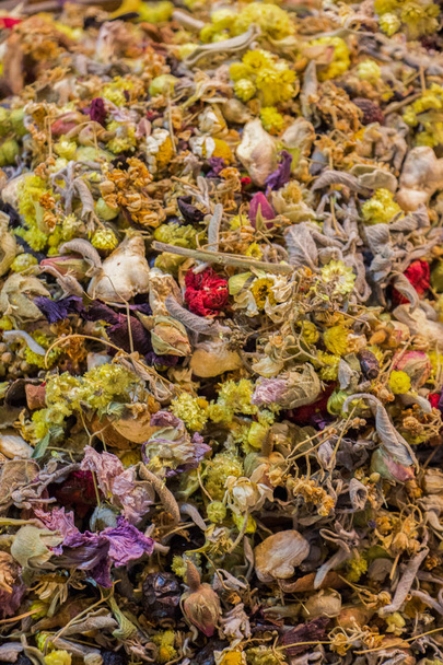 Various dry plants as herbal tea at the market for sale - Photo, Image