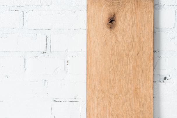 white brick wall and rustic wooden board - Фото, зображення