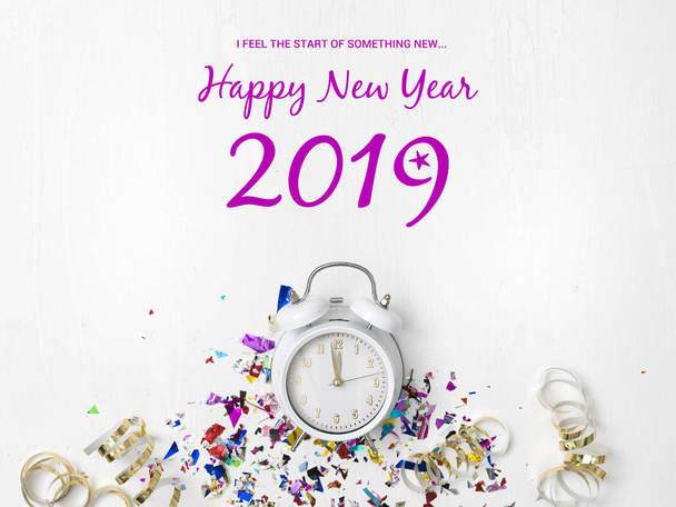 greeting card with alarm clock and shiny colorful confetti with lettering isolated on white background,  New year eve concept - Foto, Bild