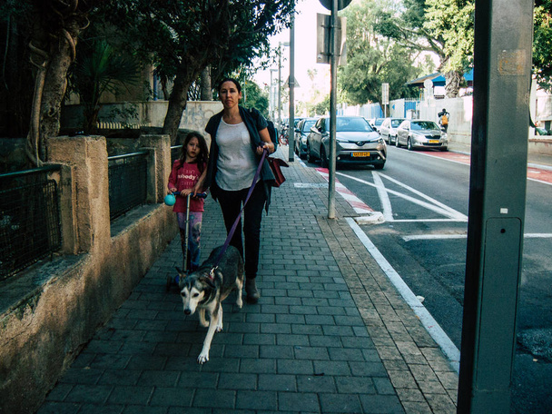 Tel Aviv Israel November 25, 2018  View of unknown Israeli people walking in the streets of Tel Aviv in the afternoon - Photo, Image