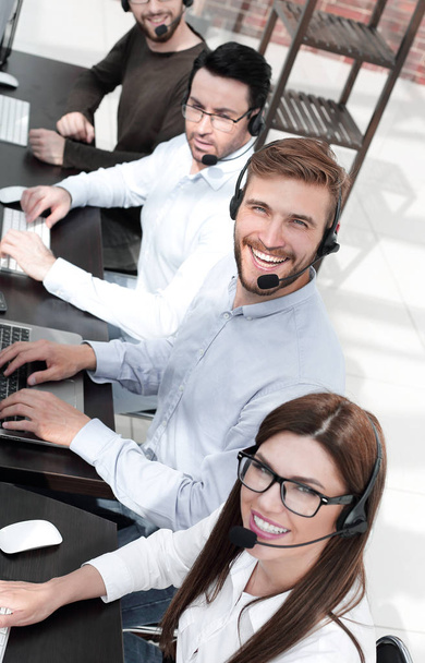 close up.smiling call center specialists in the workplace - Valokuva, kuva
