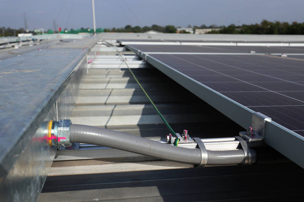 Flexible Conduit connected to Wireway Solar PV Rooftop - Photo, Image