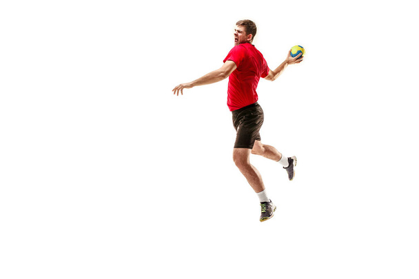 The one caucasian young man as handball player at studio on white background - Foto, Imagem
