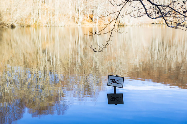 No swimming placard on a dangerous lake - Photo, Image