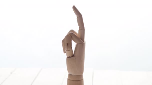 Wooden artificial hand is showing hidden message - Footage, Video