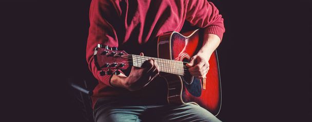 Guitar acoustic. Play the guitar. Live music. Music festival. Instrument on stage and band. Music concept. Electric guitar, string, guitarist, musician rock. Musical instrument. Guitars and string - Photo, Image